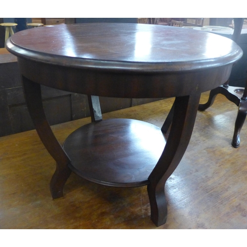 122 - An Art Deco circular beech coffee table