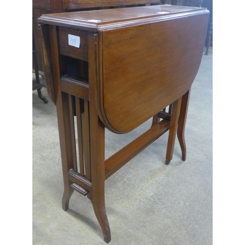 130 - An Edward VII mahogany Sutherland table