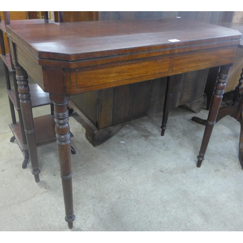 132 - A George IV inlaid mahogany fold-over card table