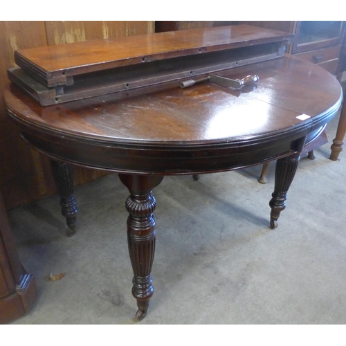 137 - A late Victorian mahogany extending dining table