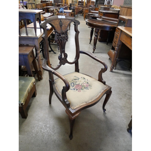 153 - An Edward VII inlaid mahogany elbow chair