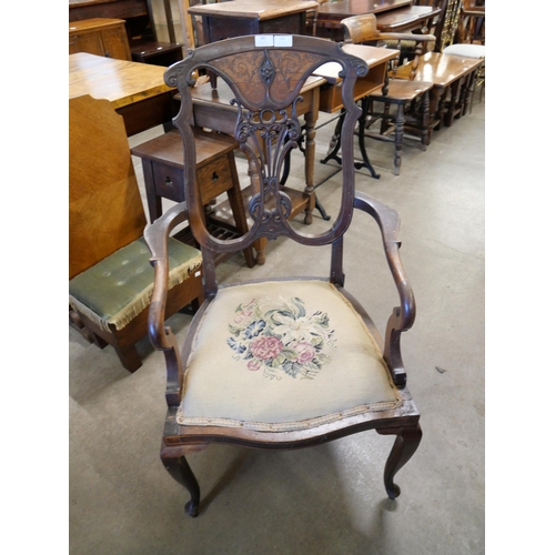 153 - An Edward VII inlaid mahogany elbow chair