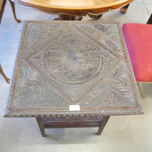 155 - A cast iron and mahogany topped side table