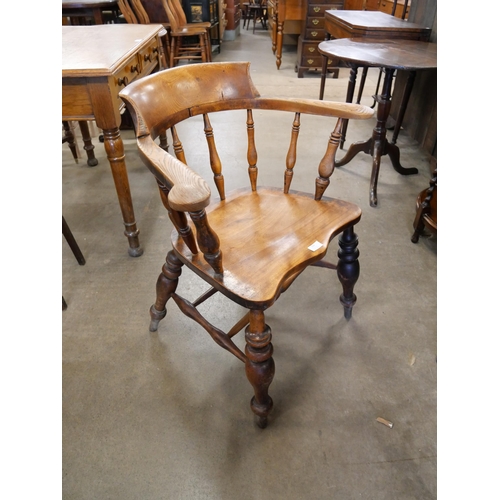 159 - A Victorian elm and beech smokers bow chair