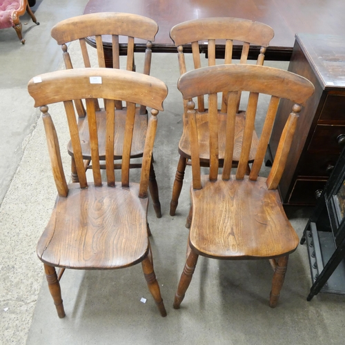 164 - A set of four Victorian elm and beech farmhouse kitchen chairs