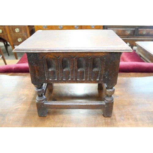 169 - A 17th Century style carved Ipswich oak box stool