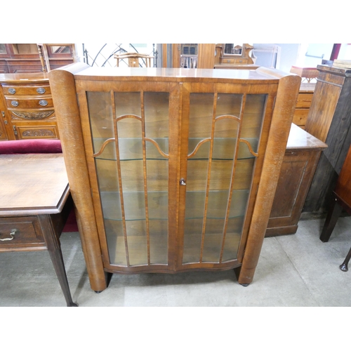 171 - An Art Deco walnut display cabinet