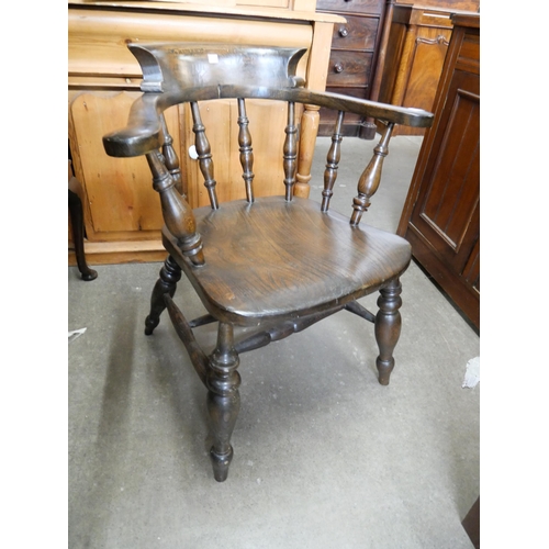 172 - A Victorian elm and beech smokers bow chair