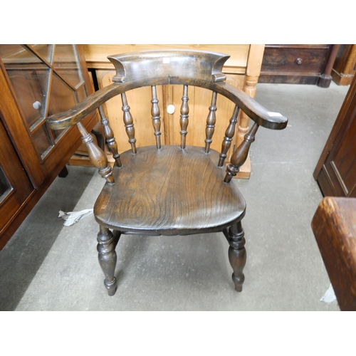 172 - A Victorian elm and beech smokers bow chair