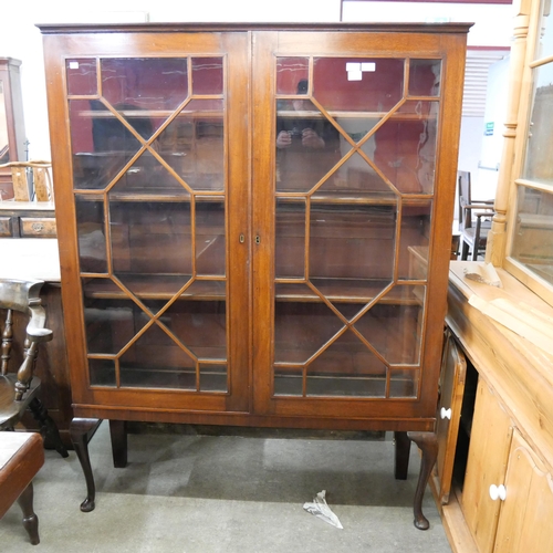 173 - An Edward VII mahogany two door bookcase