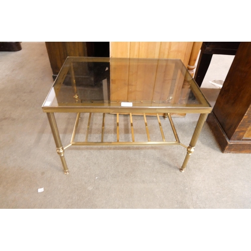 175 - An Italian brass and glass topped coffee table