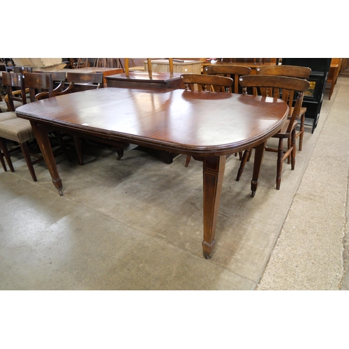 182 - An Edward VII inlaid mahogany dining table