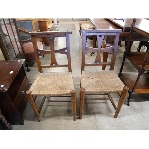 188 - A pair of early 20th Century Irish beech chapel chairs