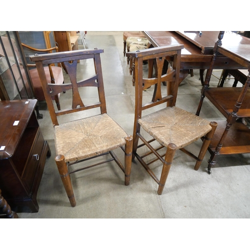 188 - A pair of early 20th Century Irish beech chapel chairs