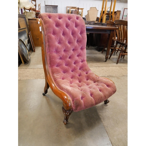 200 - A Victorian walnut and fabric upholstered nursing chair