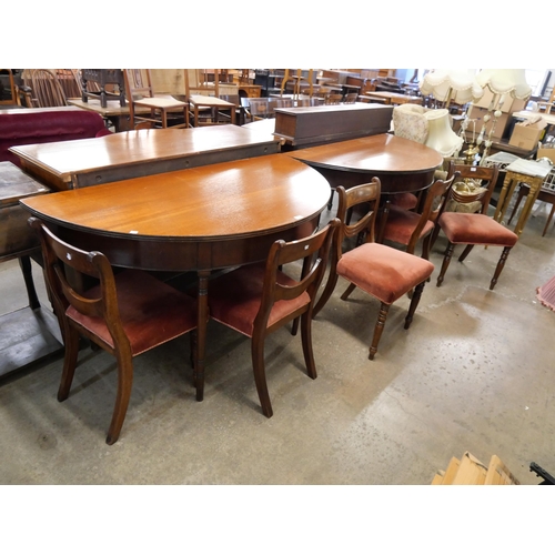 208 - A pair of George IV mahogany demi-lune console tables