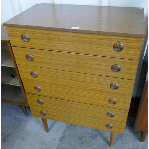 22 - A teak chest of drawers