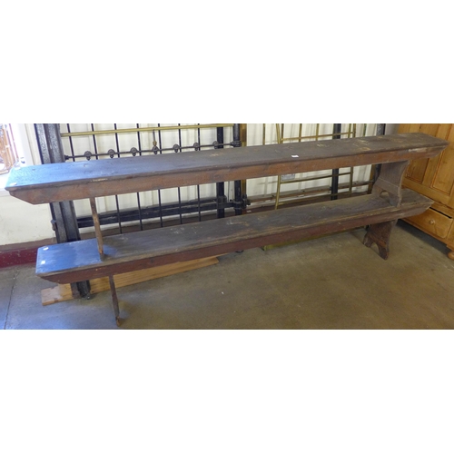 220 - A pair of long Victorian stained pine benches