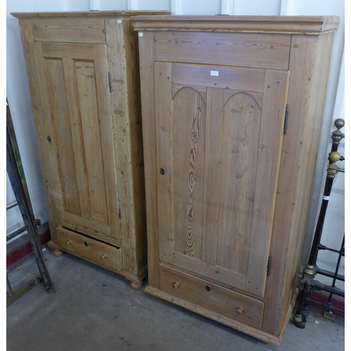 221 - A pair of similar 19th Century French pine single door wardrobes