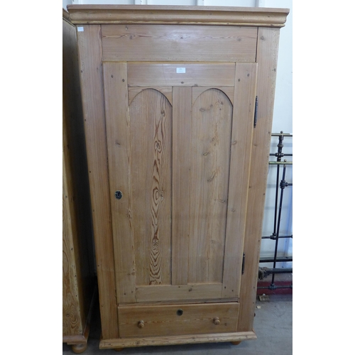 221 - A pair of similar 19th Century French pine single door wardrobes