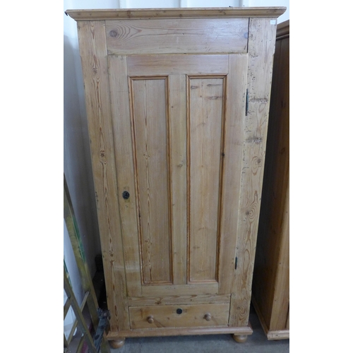 221 - A pair of similar 19th Century French pine single door wardrobes