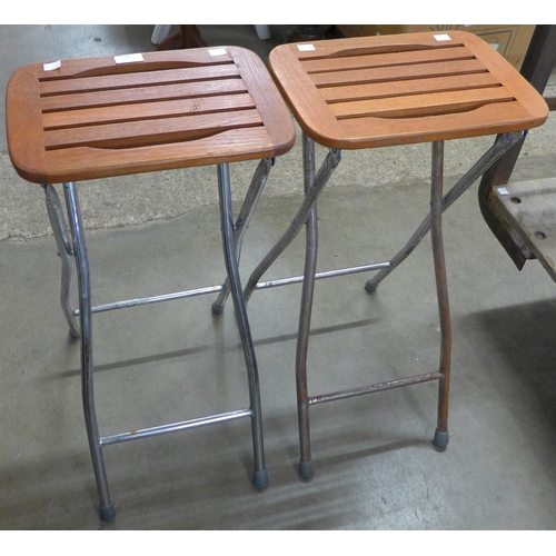 230 - A pair of teak and chrome stools