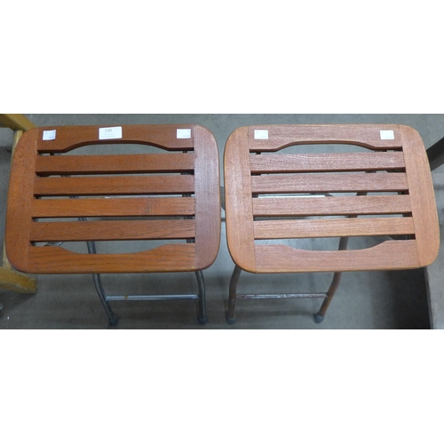 230 - A pair of teak and chrome stools