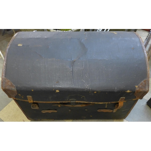 235 - A vintage fitted dome topped steamer trunk