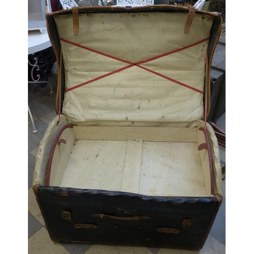 235 - A vintage fitted dome topped steamer trunk