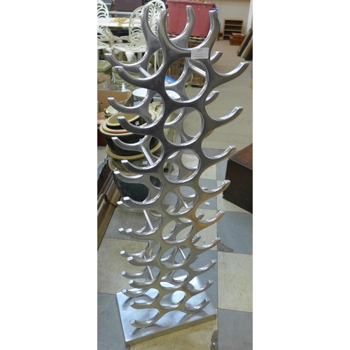 237 - A chrome wine rack