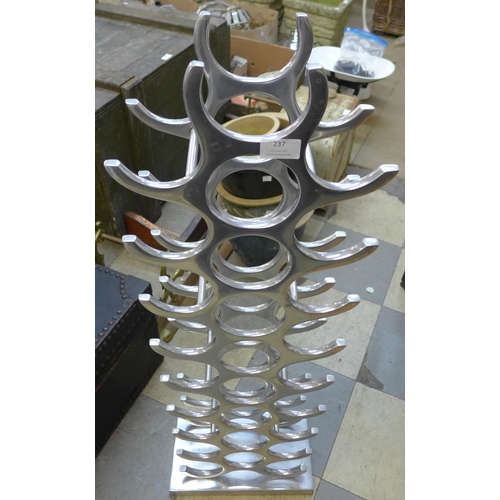 237 - A chrome wine rack