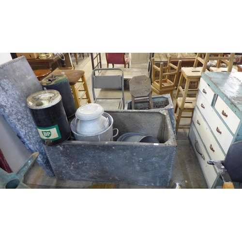 250 - Two galvanised water tanks, a bin, milk churn, two buckets and two paraffin fuel cans