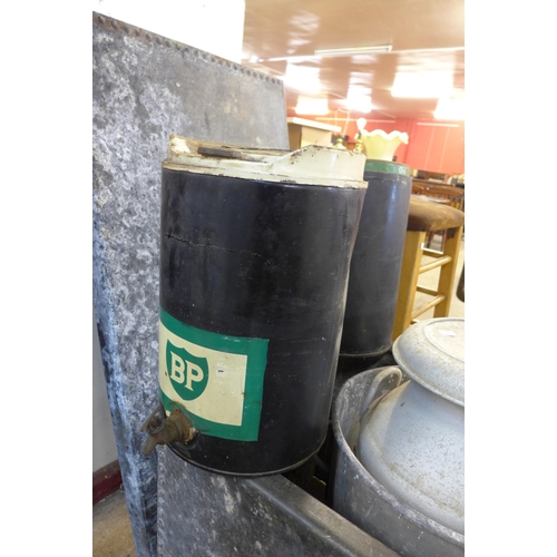 250 - Two galvanised water tanks, a bin, milk churn, two buckets and two paraffin fuel cans