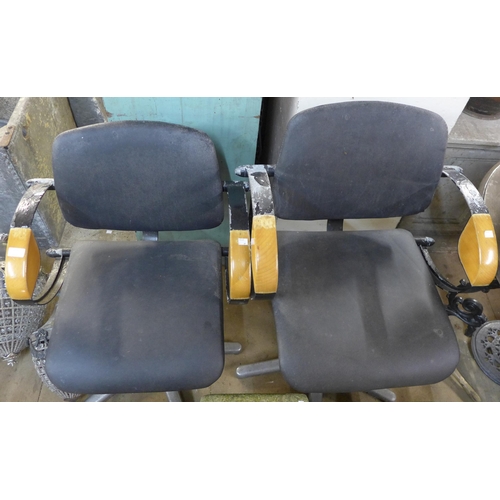 253 - A pair of revolving factory machinists chairs