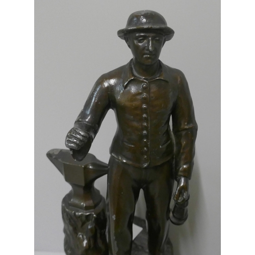 292A - A spelter figure of a miner