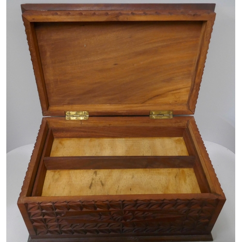 293 - A chip carved fitted hardwood box