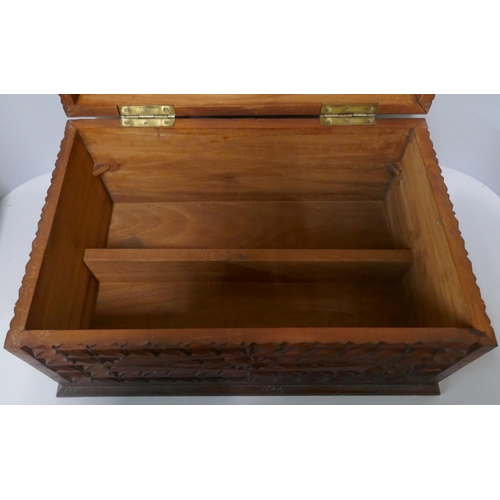 293 - A chip carved fitted hardwood box