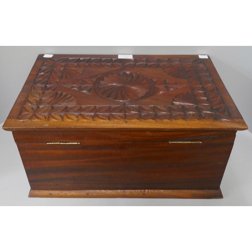 293 - A chip carved fitted hardwood box