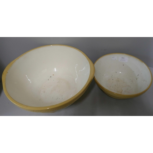 313 - Four ceramic mixing bowls