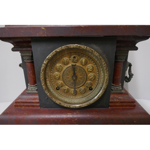 315 - A 19th Century faux marble mantel clock