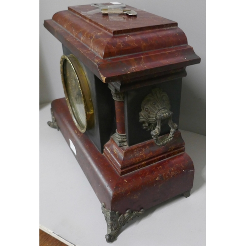 315 - A 19th Century faux marble mantel clock