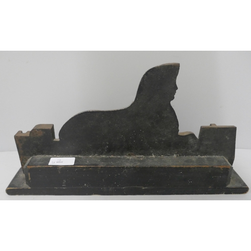 316 - A regimental Sphinx doorstop, 4th Btn, Linlcolnshire Regiment