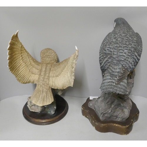 325 - Two large models of birds, Tang's Art Design Co. Peregrine Falcon and a Leonardo Collection barn owl... 