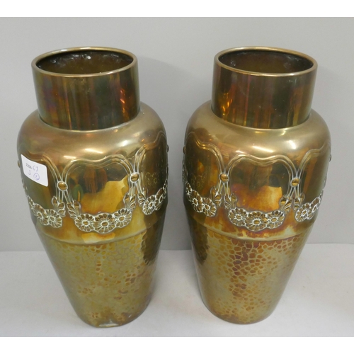 332 - A pair of W.M.F. Secessionist brass vases