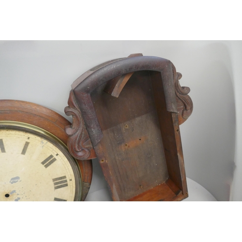 334 - A 19th Century drop dial wall clock case with dial, bezel and assorted clock weights