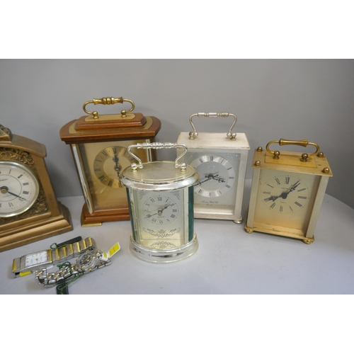 336 - Six clocks including one onyx, four carriage clocks, and two wristwatches by Quernex