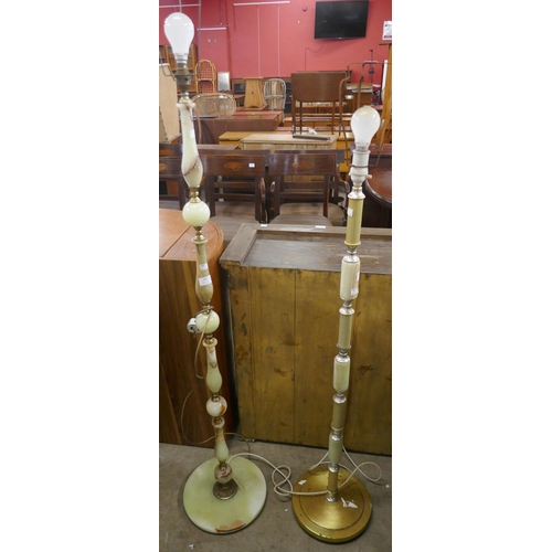 348 - Two onyx standard lamps