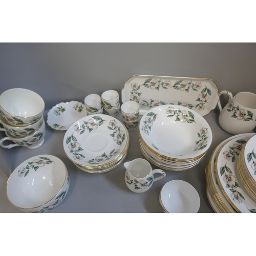 354 - A Crown Staffordshire tea and dinner service, six/seven setting, 49 pieces