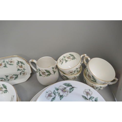 354 - A Crown Staffordshire tea and dinner service, six/seven setting, 49 pieces