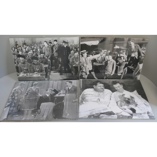 355 - Fourteen black and white Laurel & Hardy prints